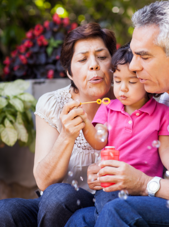 grand parents with granddaughter