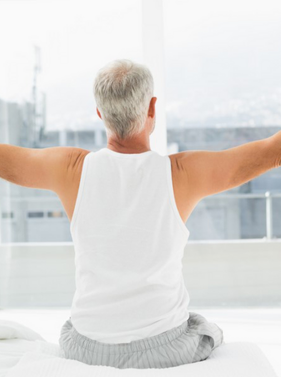 Man refreshed after good night sleep